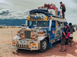 negros island jeepney overloaded with luggage and people.