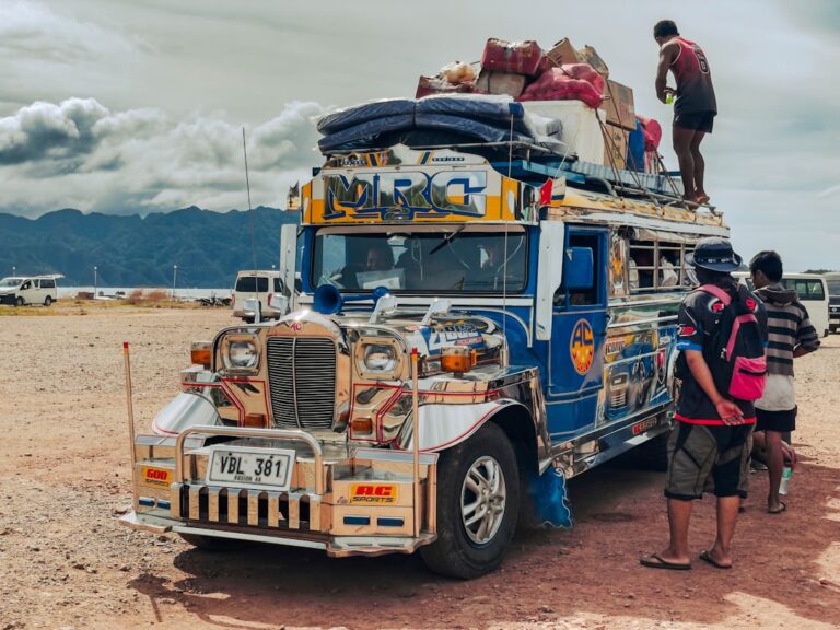 negros island jeepney overloaded with luggage and people.